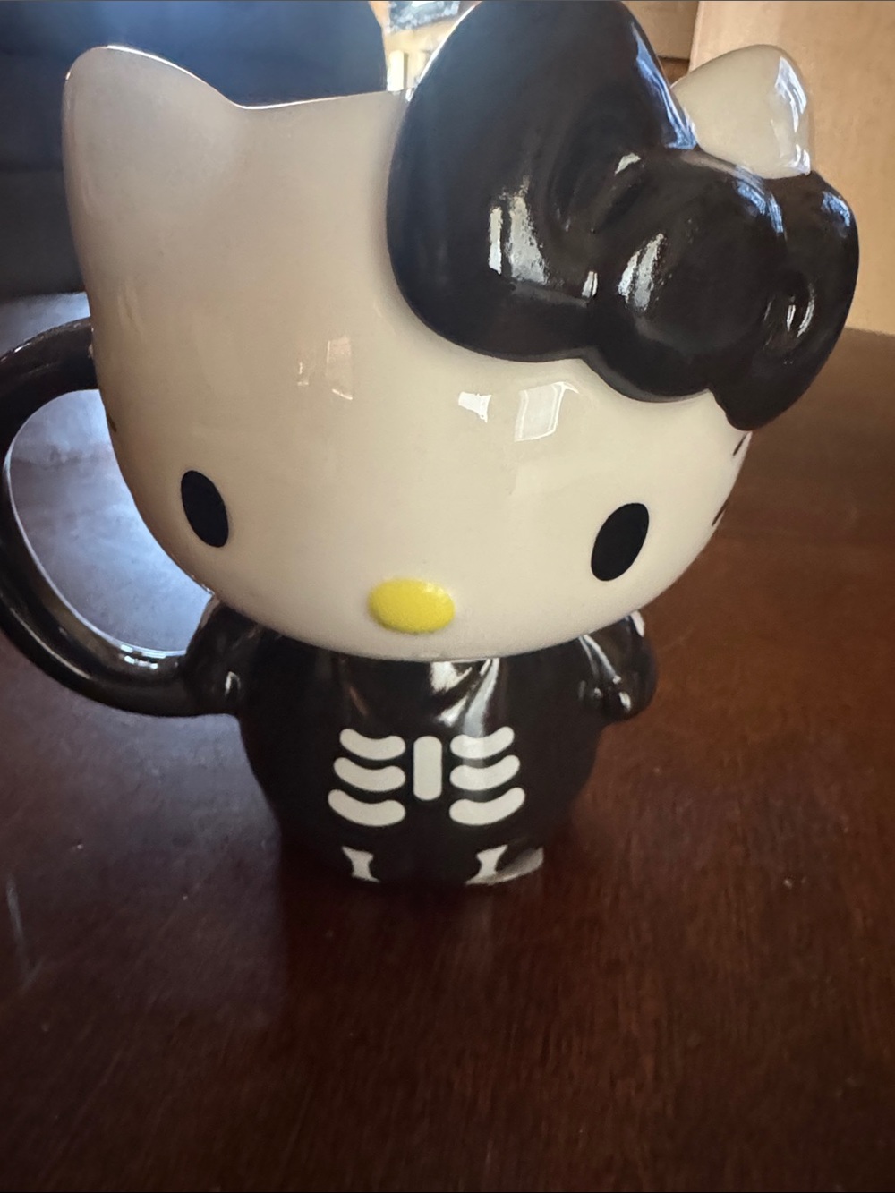 Hello Kitty Black & White Skeleton Ceramic Mug with Yellow Nose